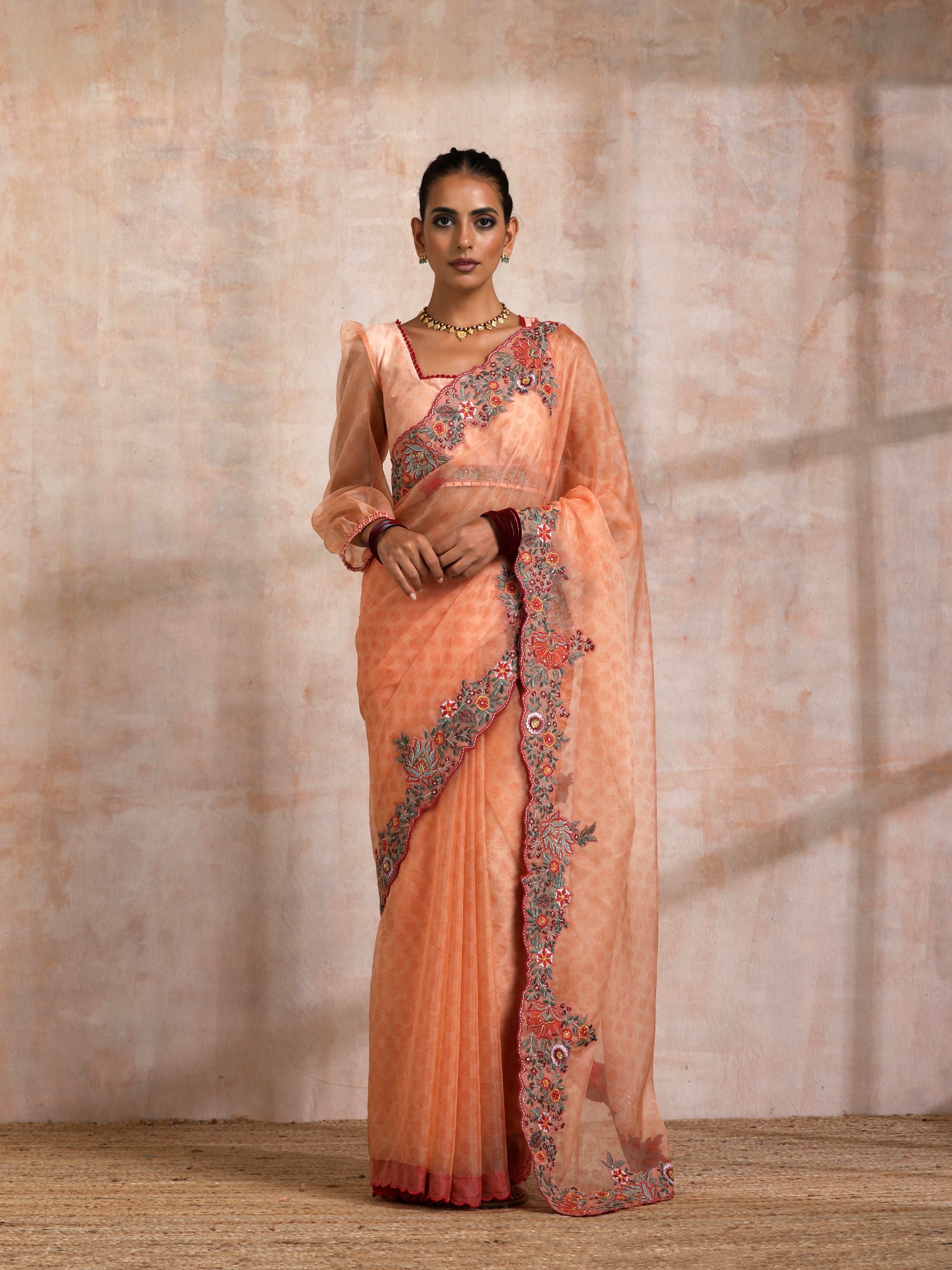 KESARI ORGANZA SAREE WITH HEAVY PALLU EMBROIDERY