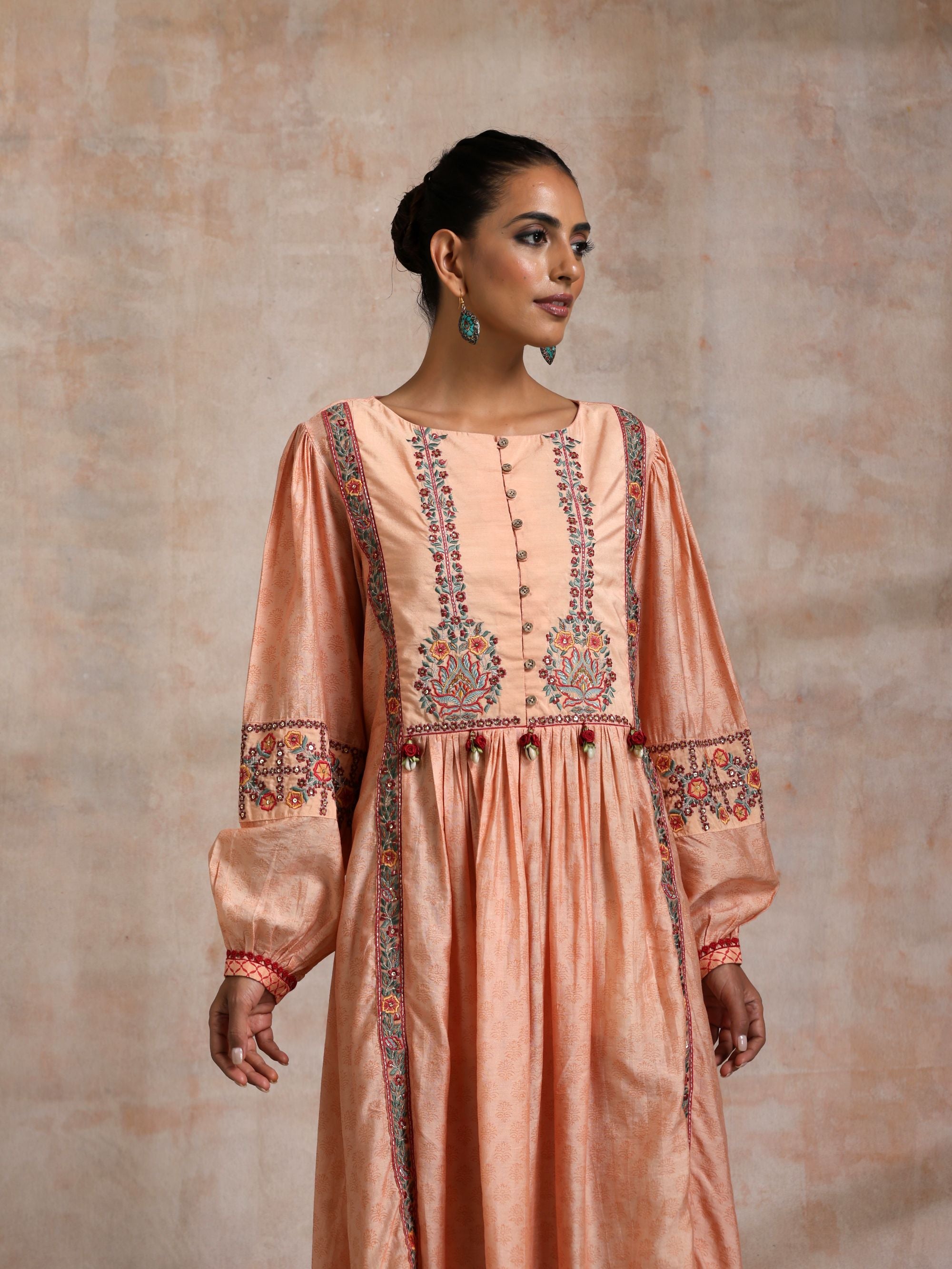 KESARI CHANDERI CHOGA WITH EMBROIDERED YOKE AND BALLOON SLEEVES