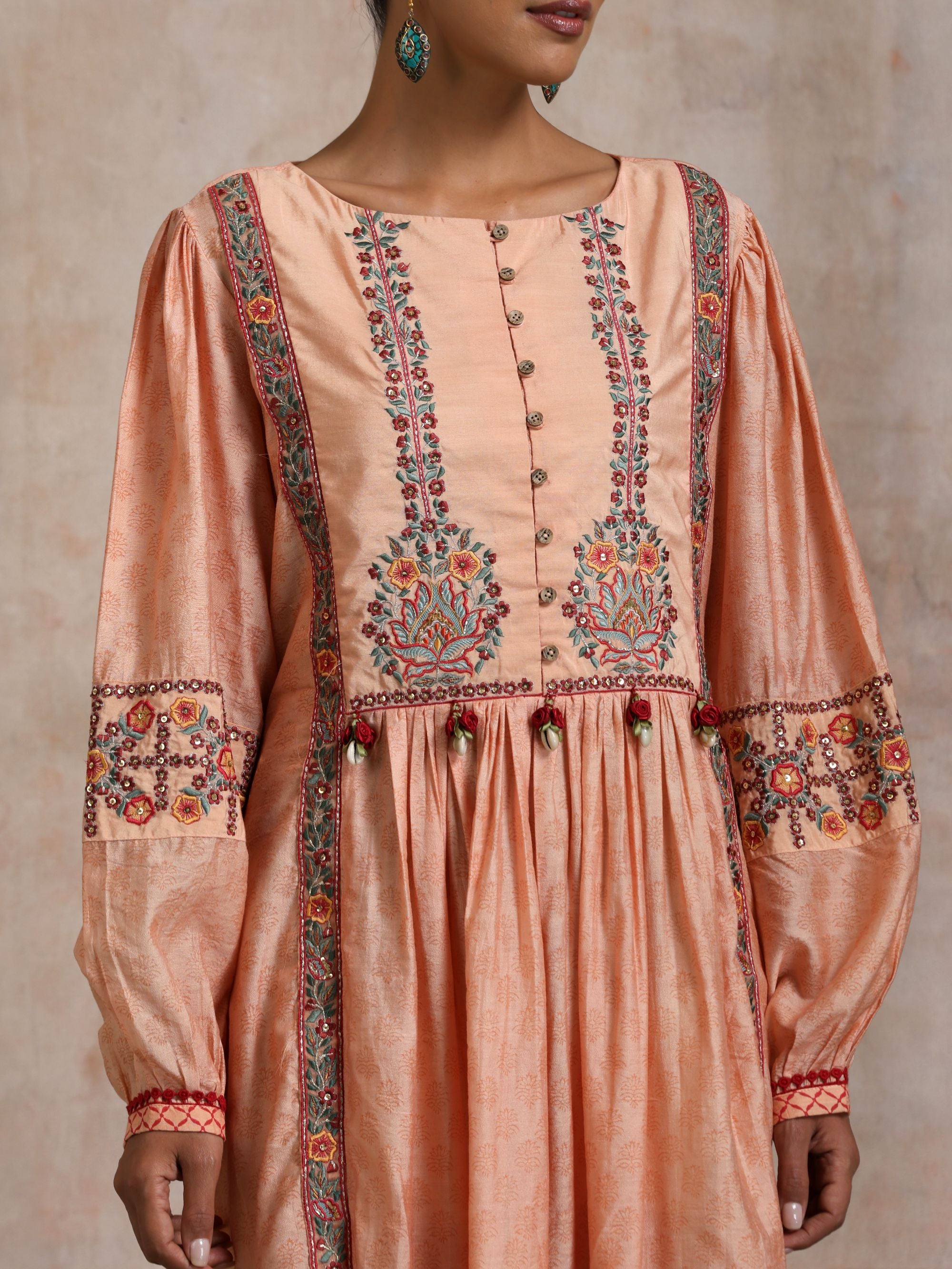 KESARI CHANDERI CHOGA WITH EMBROIDERED YOKE AND BALLOON SLEEVES